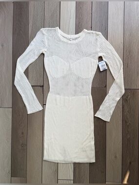 NIA "Anja" mini dress featuring an ivory ribbed pointelle knit design